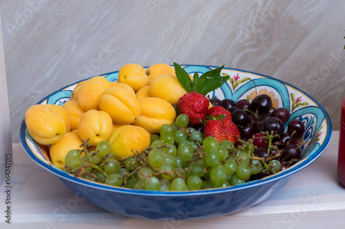 Food table with healthy delicious organic meal concept. People friends celebrate and eat healthy organic meals at served festive wooden table served for party.