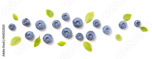 Fresh blueberries and leaves, berry ornament isolated on white background, top view