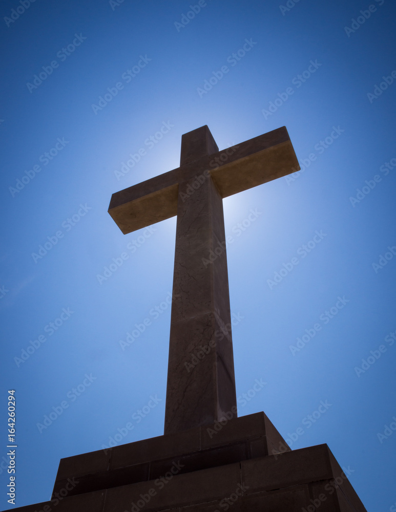 Cross with bright blue sky