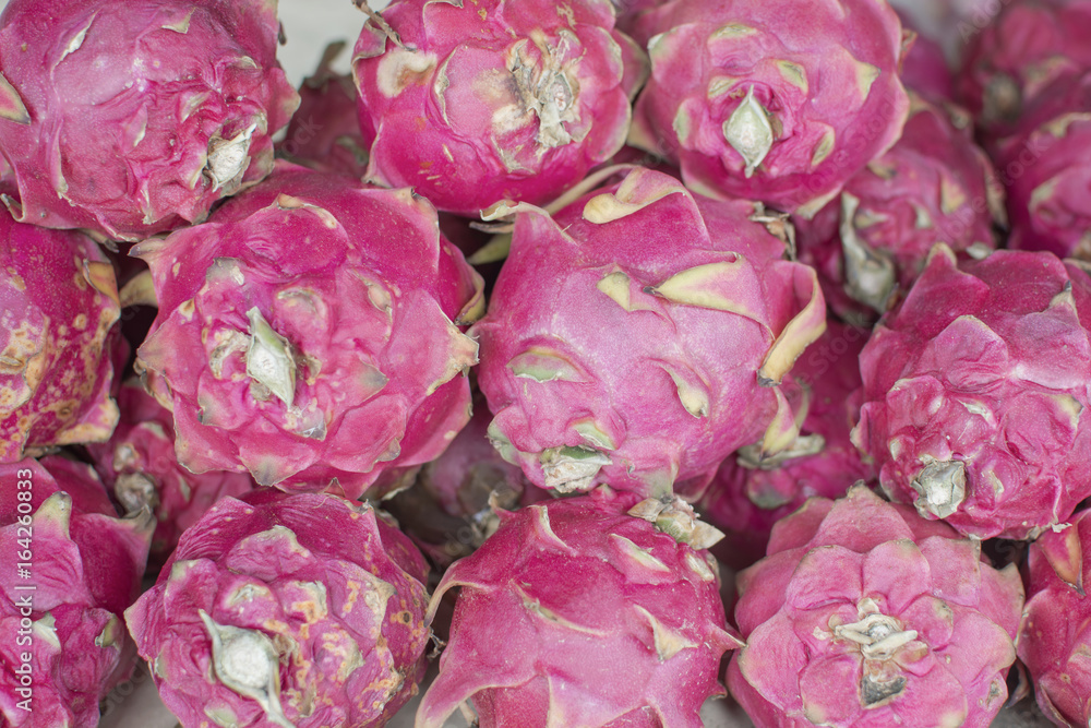 Pile of dragon fruits in the market, fruit business