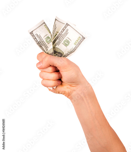 hand holding crumpled dollar bills