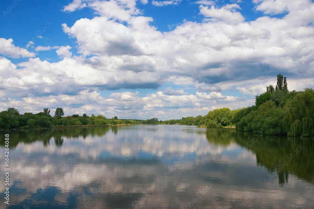 Clouds over the lake. Ukraine, Uman, Ostashivskiy lake