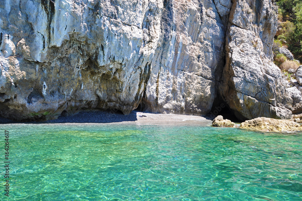 Wild beach with emerald water on the Amalfi coast
