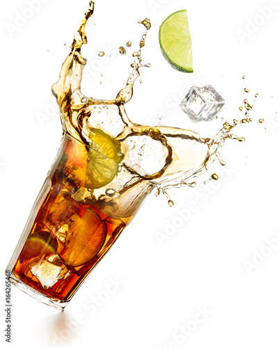 Fotografie cuba libre cocktail splashing isolated on white