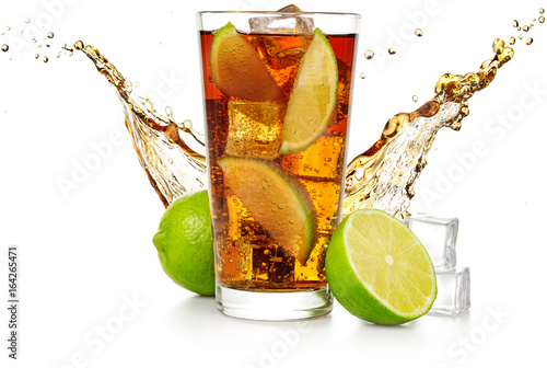 Bild auf Leinwand cuba libre with flowing wave, lime fruit and ice cubes