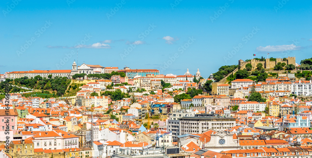 Panoramic view at the Alfama district with Sao Jorge catle from Santa Justa in Lisbon ,Portugal