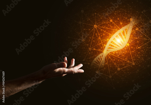 Science medicine and technology concepts as DNA molecule on dark background with connection lines