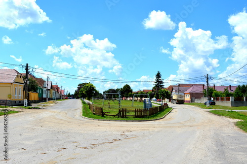 Rural landscape in the village Sacele, Brasov county, Transylvania. photo