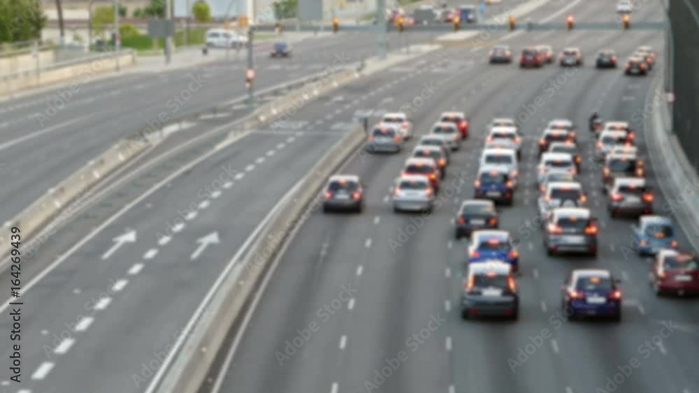 Blurred evening urban traffic scene with a top and rear view access roads to Barcelona.Time Lapse. Blurred evening urban traffic scene with a top and rear view access roads to Barcelona.Time Lapse.