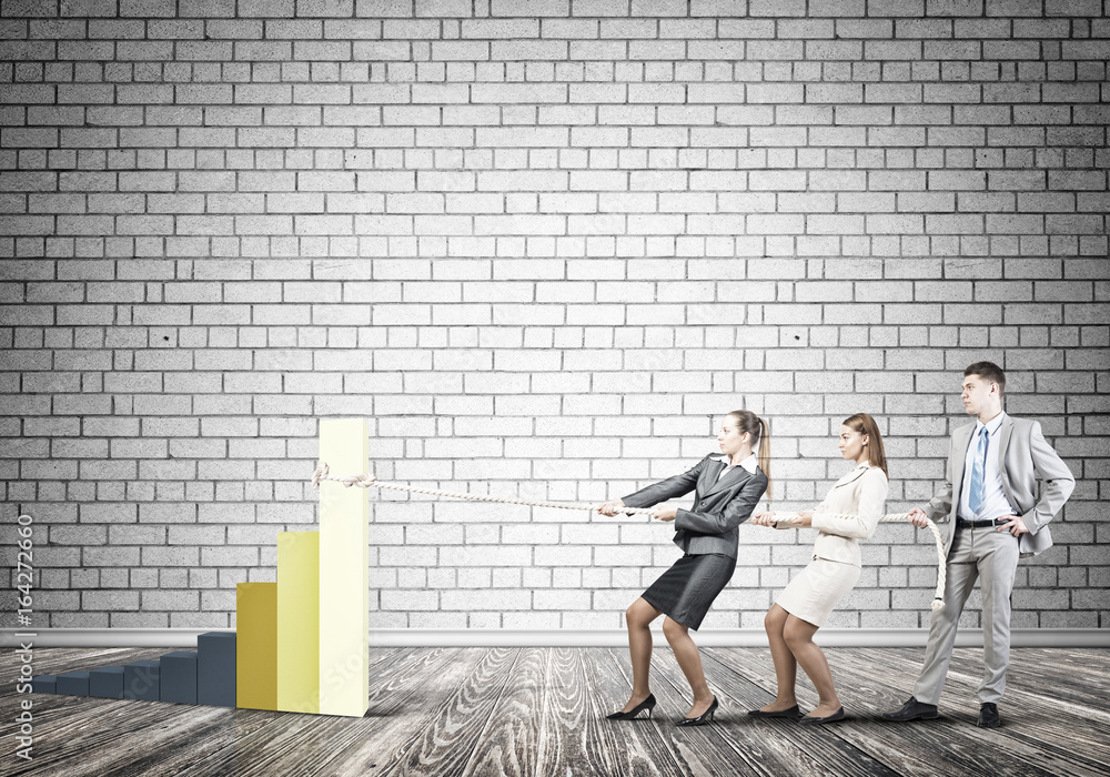 Businessteam working in collaboration pulling graph with rope as symbol of power and control Businessteam working in collaboration pulling graph with rope as symbol of power and control