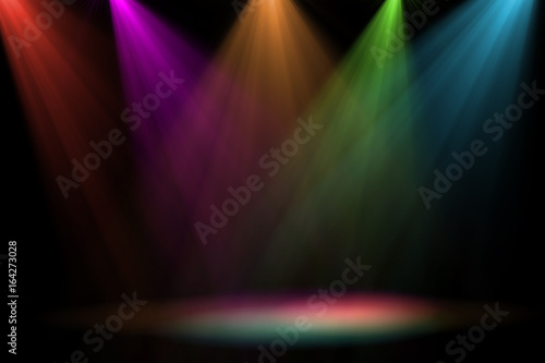 abstract of empty stage with colorful spotlights or Several bright projectors for scene lighting effects . can be used for display or montage your products