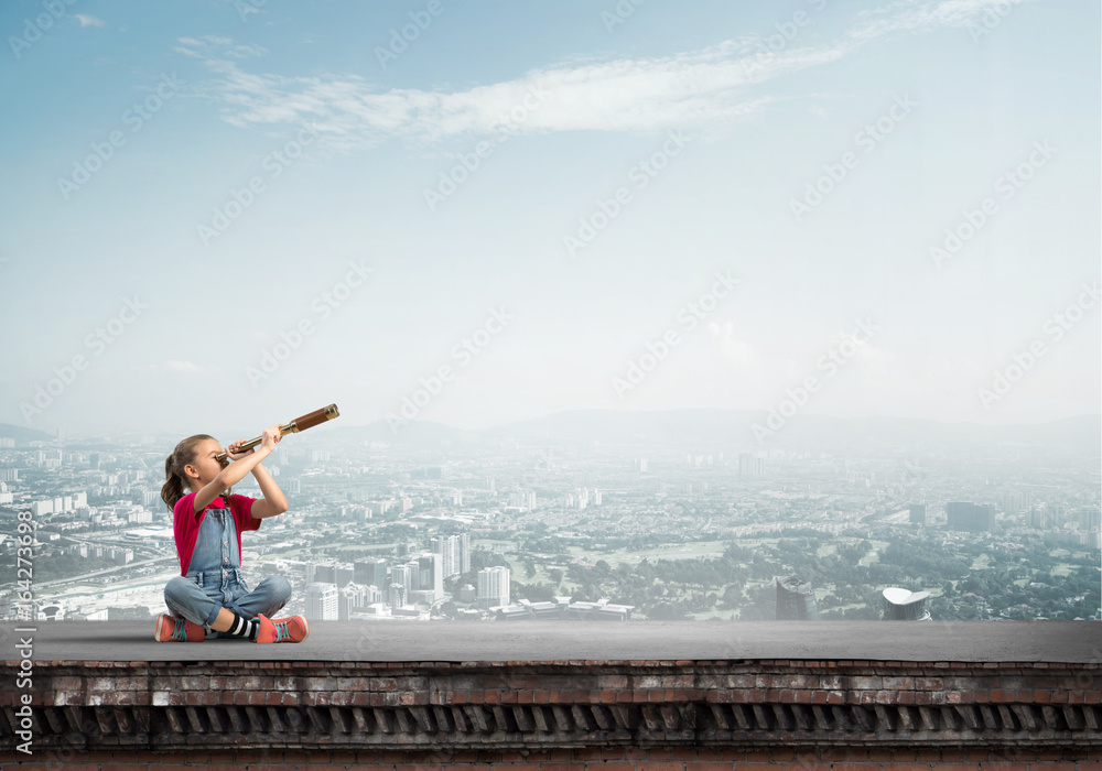 Concept of careless happy childhood with girl exploring this world Concept of careless happy childhood with girl exploring this world