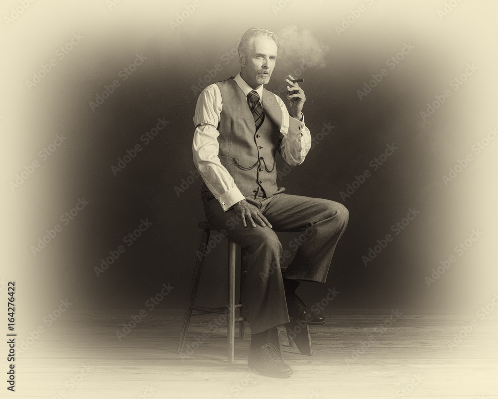Φωτογραφία Antique plate photo of cigar smoking vintage 1920s man wearing suit sitting on wooden stool