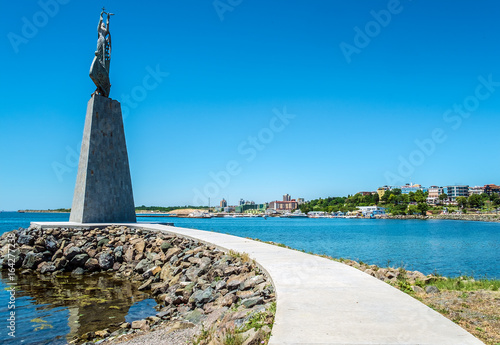 Monument to the patron of sailors St. Nicholas, that is located on a tiny artificial island in the Old Town Nessebar. It is also called Fisherman and New Noah. Bulgaria. photo