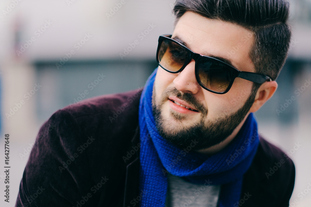 Handsome young man on a walk in town Handsome young man on a walk in town