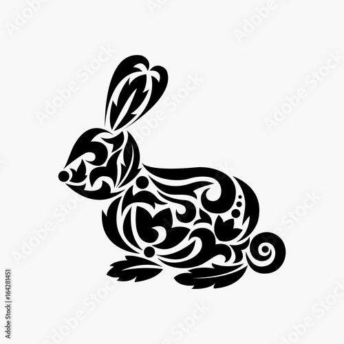 Rabbit silhouette. Tattoo. Vector illustration. Silhouette of rabbit with ornament.