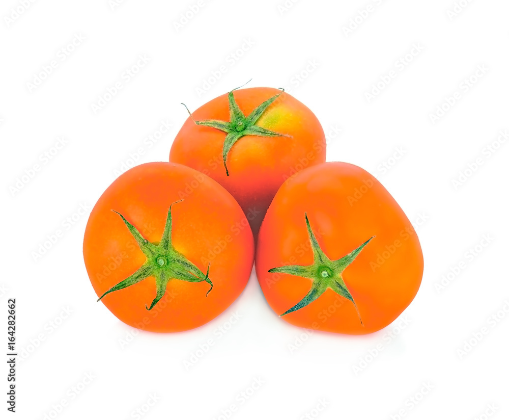 Three tomatoes isolated on white background, close up Three tomatoes isolated on white background, close up