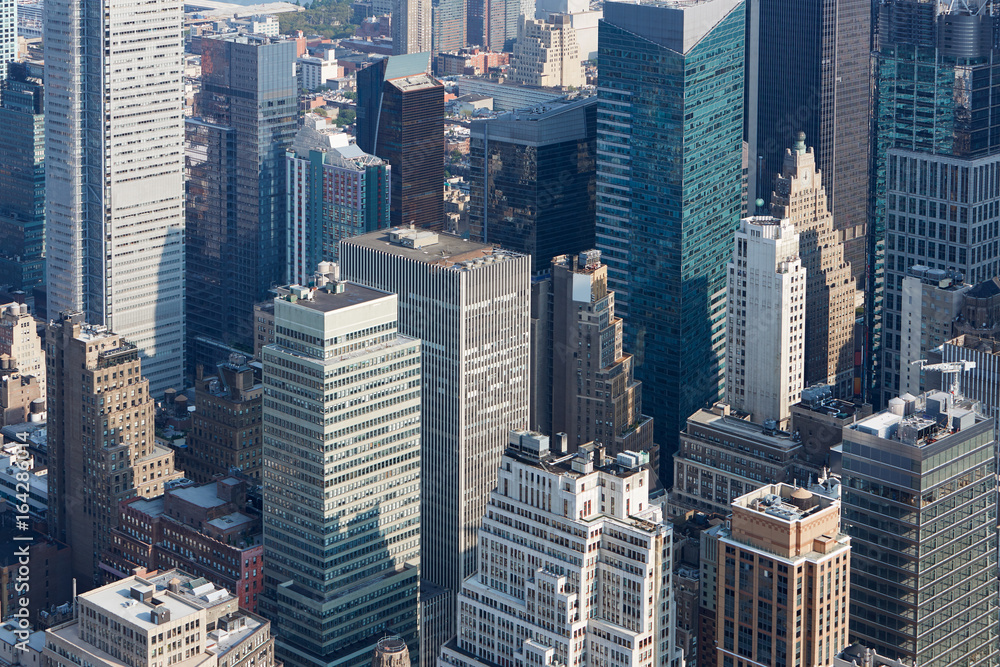 New York City Manhattan aerial view with skyscrapers in a clear sunny day New York City Manhattan aerial view with skyscrapers in a clear sunny day
