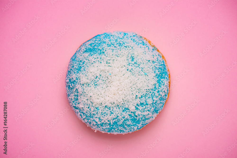 Donuts with icing on pastel pink background with copyspace. Sweet donuts. Donuts with icing on pastel pink background with copyspace. Sweet donuts.