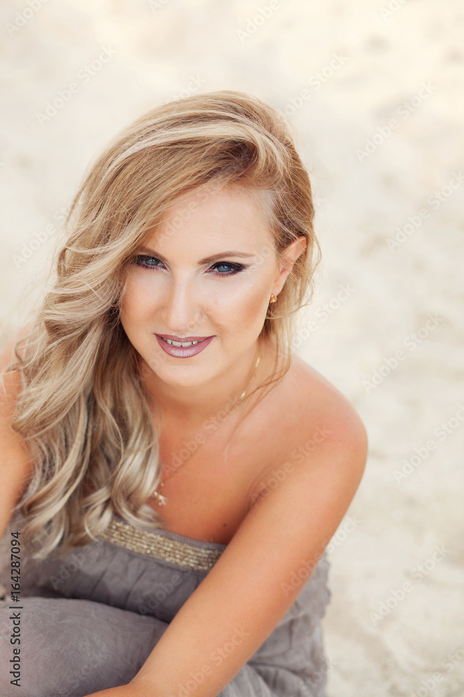Beautiful woman on the sand beach Beautiful woman on the sand beach