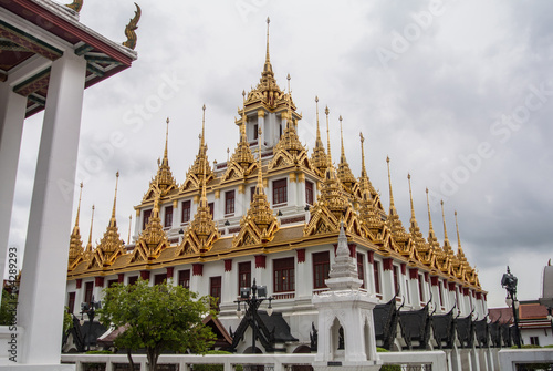 Loha Prasat Wat Ratchanatdaram in Bangkok Thailand which means iron castle or monastery is composes of five towers, of which the outer, middle and the center tower contain large black iron spires. 