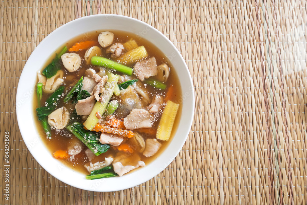 Fried wide rice noodle with pork and gravy sauce. Asian food. Healthy and tasty menu. Top view. Fried wide rice noodle with pork and gravy sauce. Asian food. Healthy and tasty menu. Top view.
