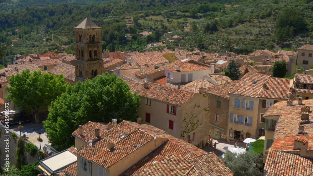 Beautiful ancient village Moustiers-Sainte-Marie in Provence, France. Panning shot Beautiful ancient village Moustiers-Sainte-Marie in Provence, France. Panning shot
