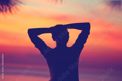 Woman relaxing on the beach