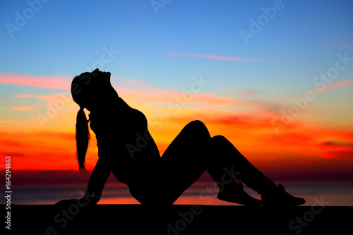 Woman enjoying sunset