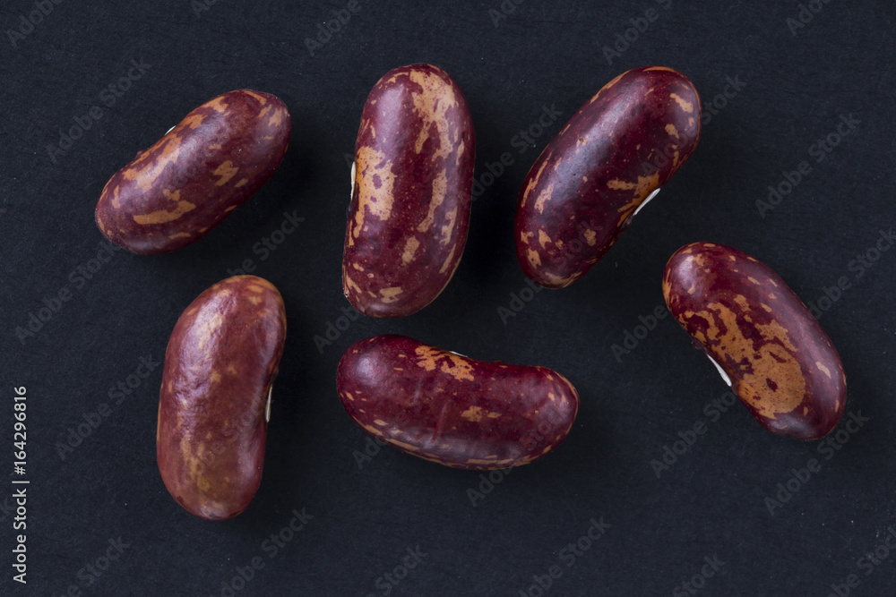 Some fresh red beans closuep on the black background. Some fresh red beans closuep on the black background.