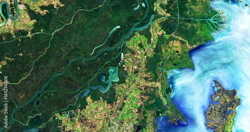 Very high-altitude enhanced color aerial of the Mississippi delta. Clip loops and is reversible. Elements of this image furnished by USGS/NASA Landsat