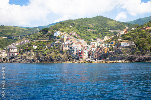 Fototapeta Naklejka Na Ścianę i Meble -  Riomaggiore in Cinque Terre, Italy - Summer 2016 - view from the sea