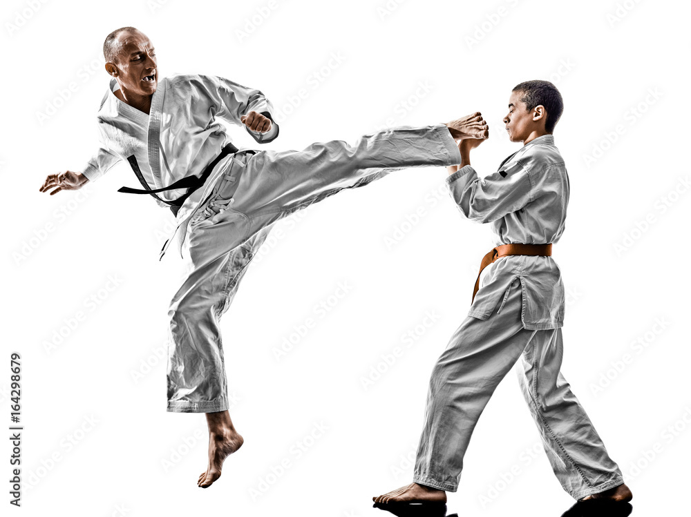 two karate men sensei and teenager student fighters fighting isolated on white background two karate men sensei and teenager student fighters fighting isolated on white background