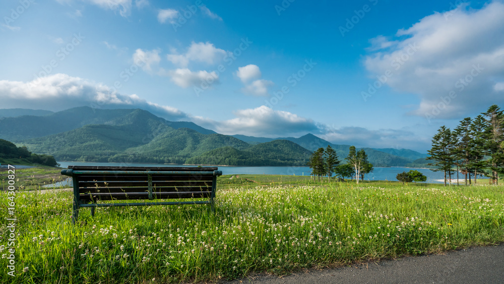 Scenic Of Mountain , Lake View And Wooden Bench In Hokkaido, Japan