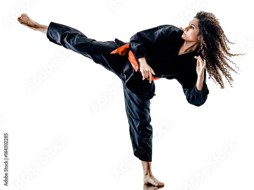 Fotografia one caucasian woman practicing martial arts Kung Fu Pencak Silat in studio isola