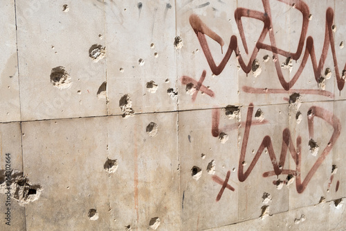 Bulletholes on a wall in Sarajevo, Bosnia and Herzegovina photo