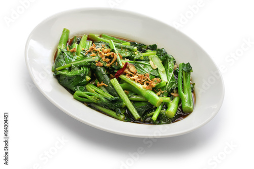 stir fried chinese kale(chinese broccoli) with oyster sauce isolated on white background