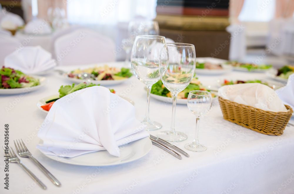 Table setting, elegant restaurant interior Table setting, elegant restaurant interior