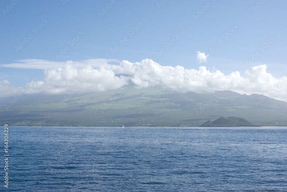 Maui with Molokini Crater. Molokini is popular for scuba diving and snorkeling
