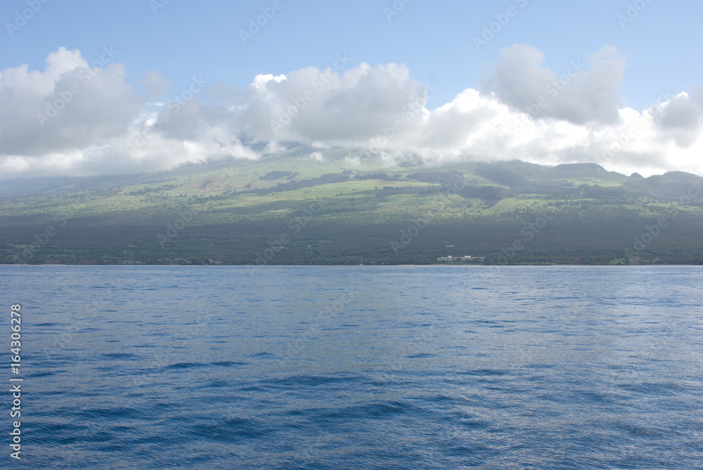Maui with Molokini Crater. Molokini is popular for scuba diving and snorkeling Maui with Molokini Crater. Molokini is popular for scuba diving and snorkeling