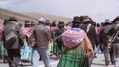 LA PAZ, BOLIVIA CIRCA FEBRUARY 2017: Men and women of the Aymara people marching to protest about the missing water in their land, wearing traditional costumes