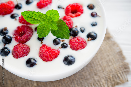 tasty yoghurt with raspberry