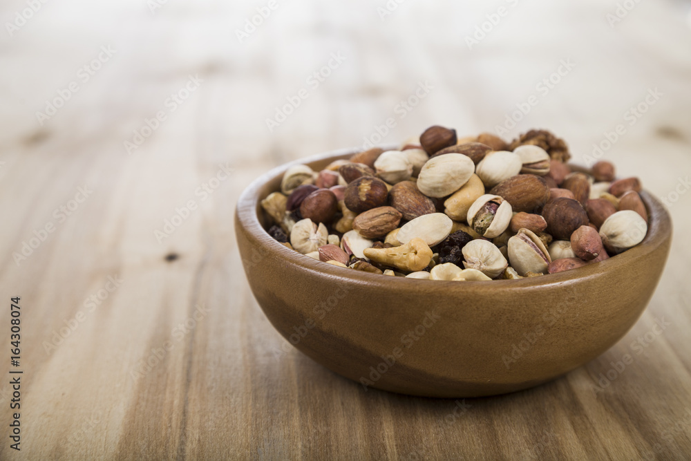 Nuts in a wooden bowl