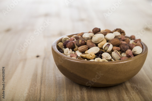 Nuts in a wooden bowl