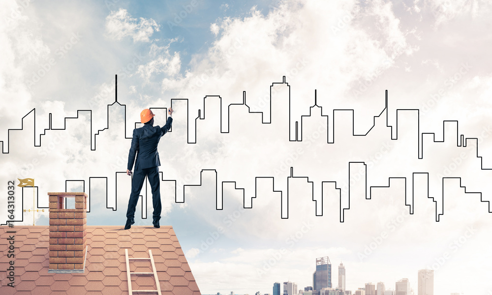 Man architect draw silhouette of modern city on blue sky. Mixed Man architect draw silhouette of modern city on blue sky. Mixed