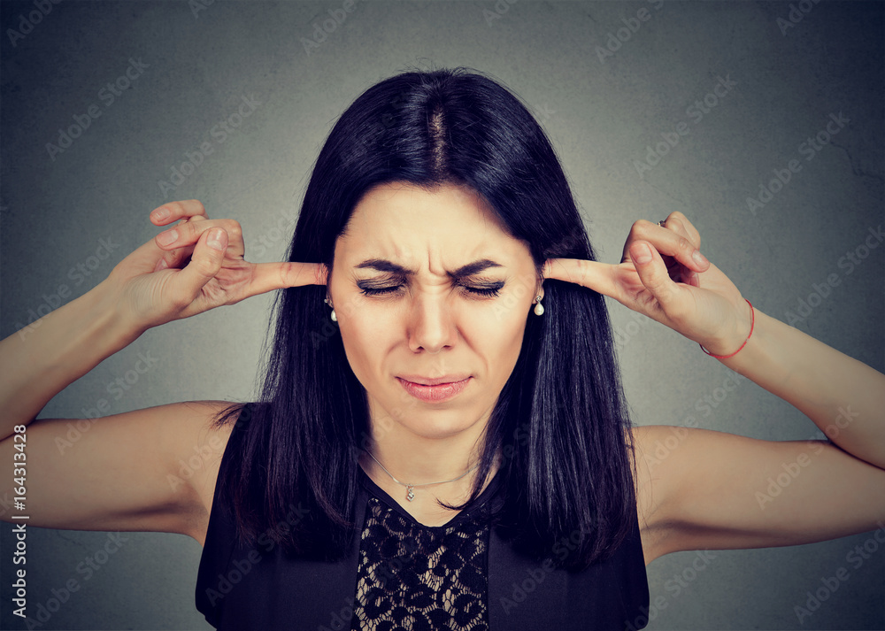 Obraz premium Too much noise. Angry woman