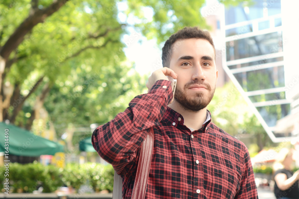 Latin man talking on the phone. Latin man talking on the phone.