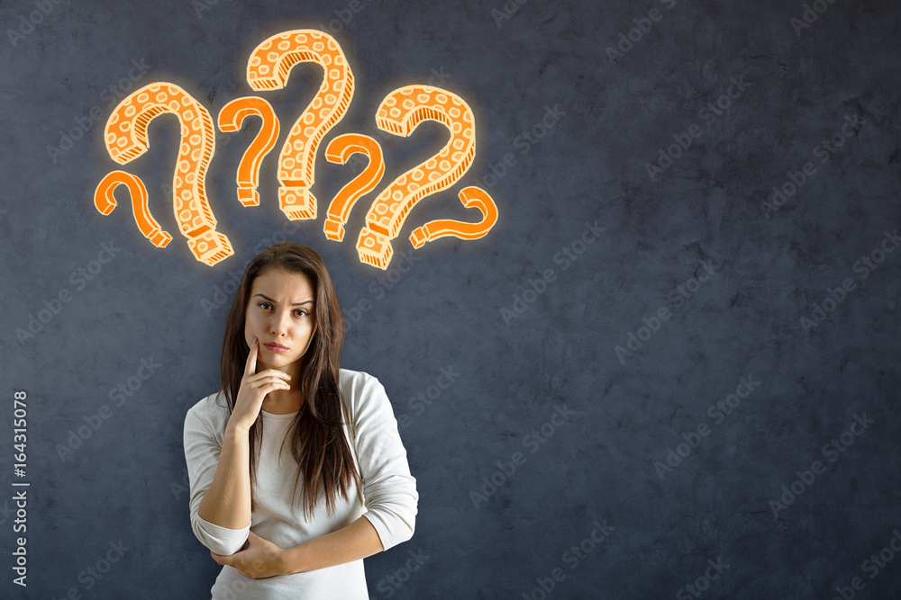 Pensive european woman with questions Pensive european woman with questions