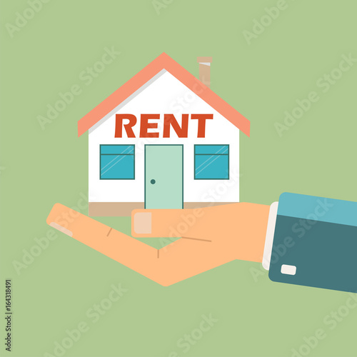 Real estate concept. Agent holding  a house for rent.
