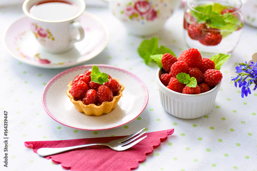 Mini tart with raspberries fruits